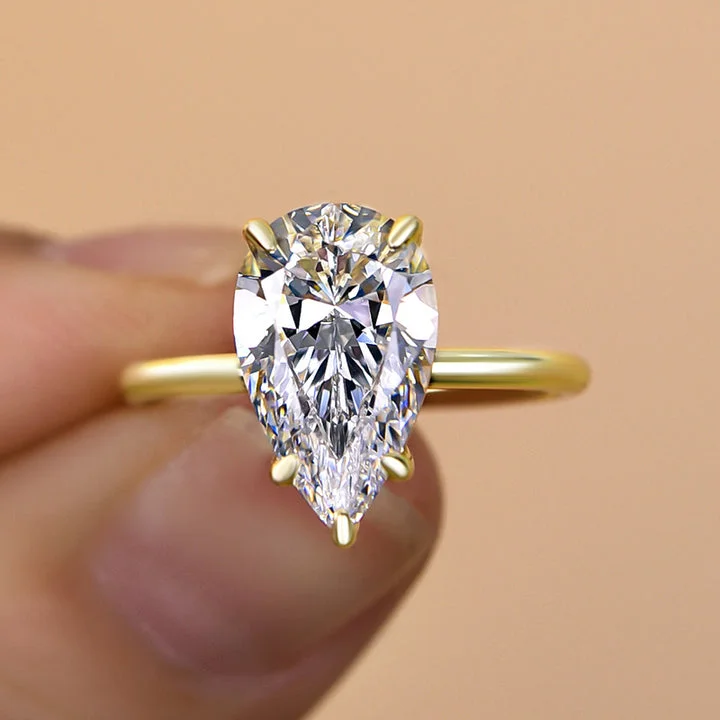 Classic Solitaire Pear Cut  Golden Tone Engagement Ring